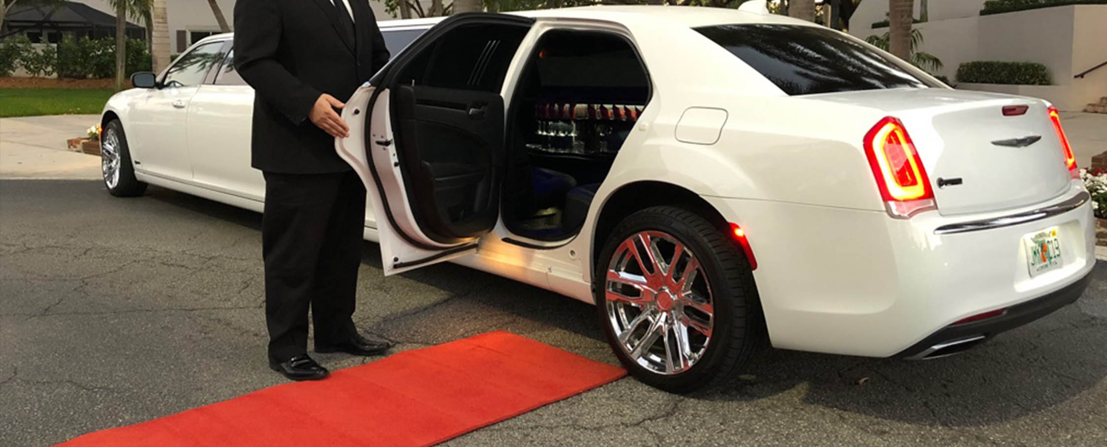 Chauffeur Opening Limousine Door